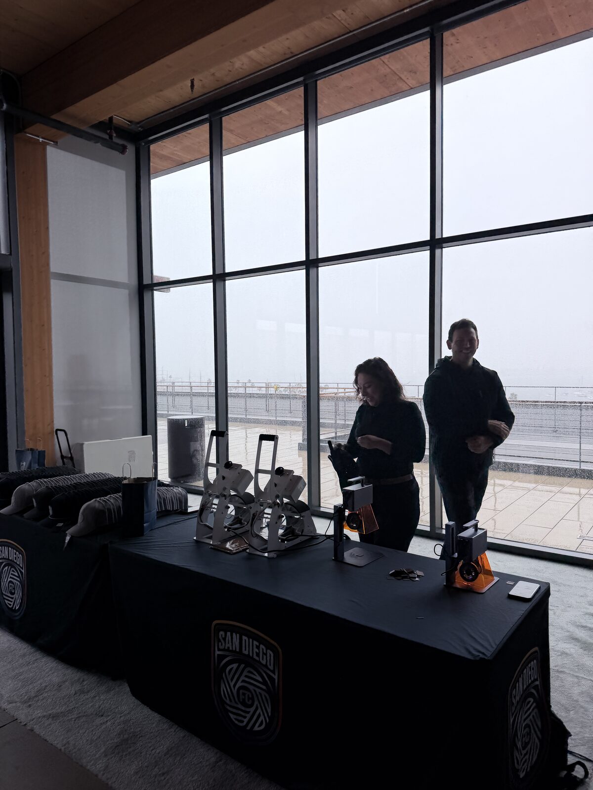 The heat-press station set up by a window